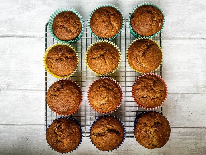 banana muffins with cinnamon on cooling rack