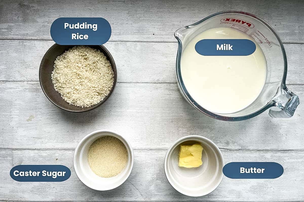 ingredients for rice pudding on the hob, pudding rice, milk, caster sugar, butter.