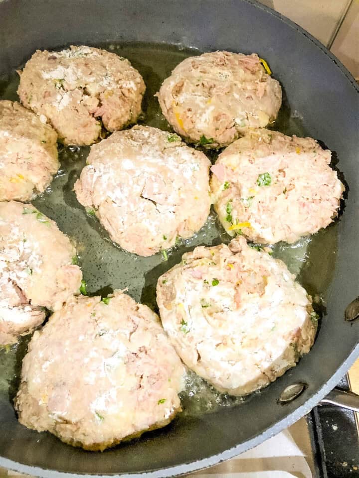 tuna patties frying in pan