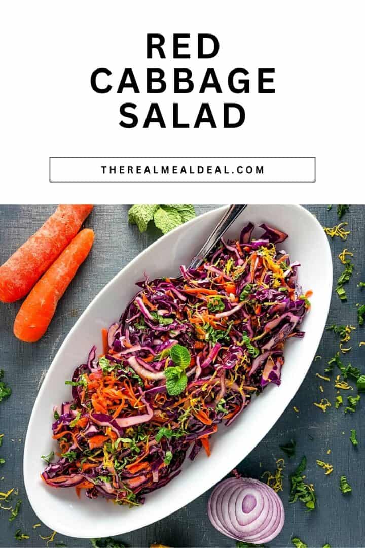 red cabbage salad with maple syrup dressing topped with lemon zest