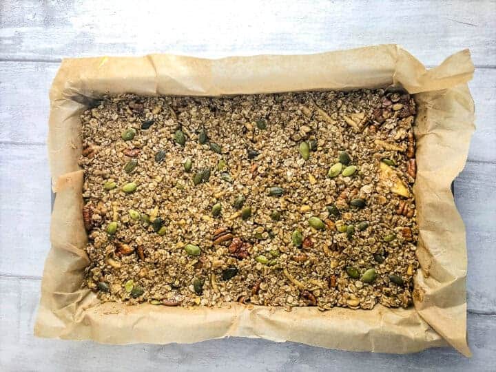 apple flapjack mixture pressed into baking tray.