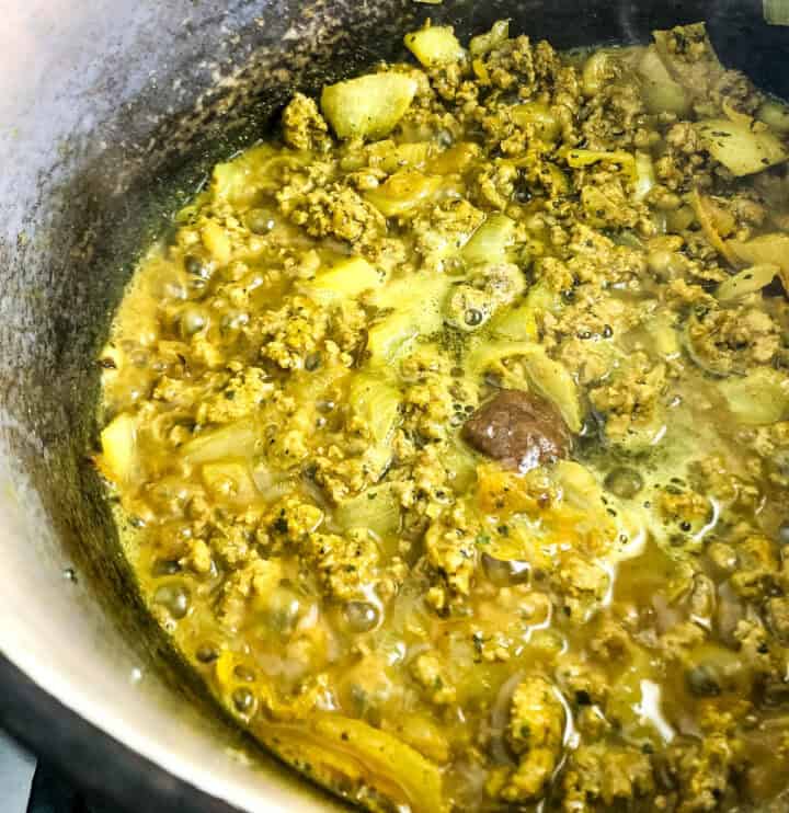 lamb stock added to lamb mince.