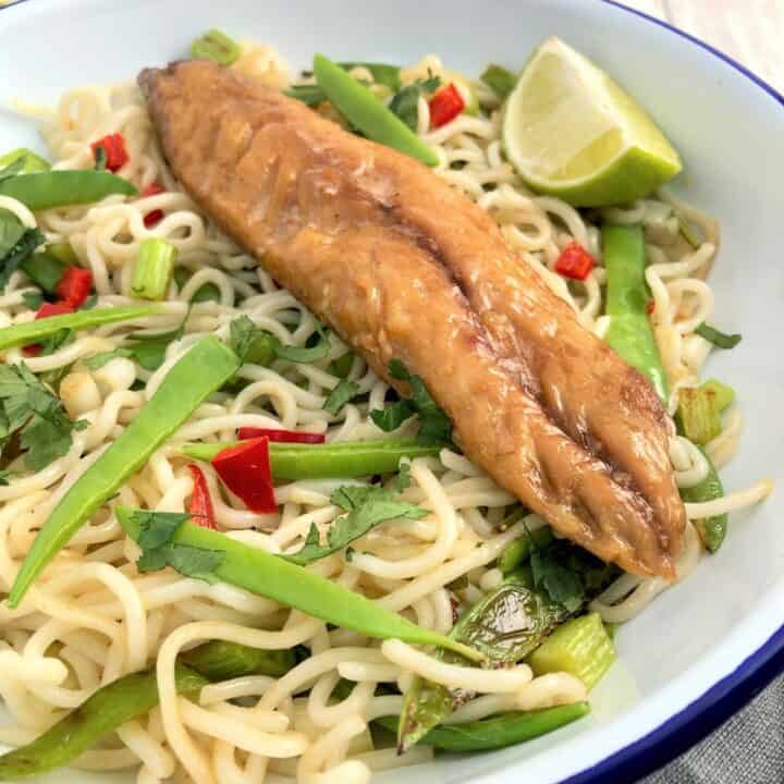 smoked mackerel salad served with whole mackerel fillet over noodles.